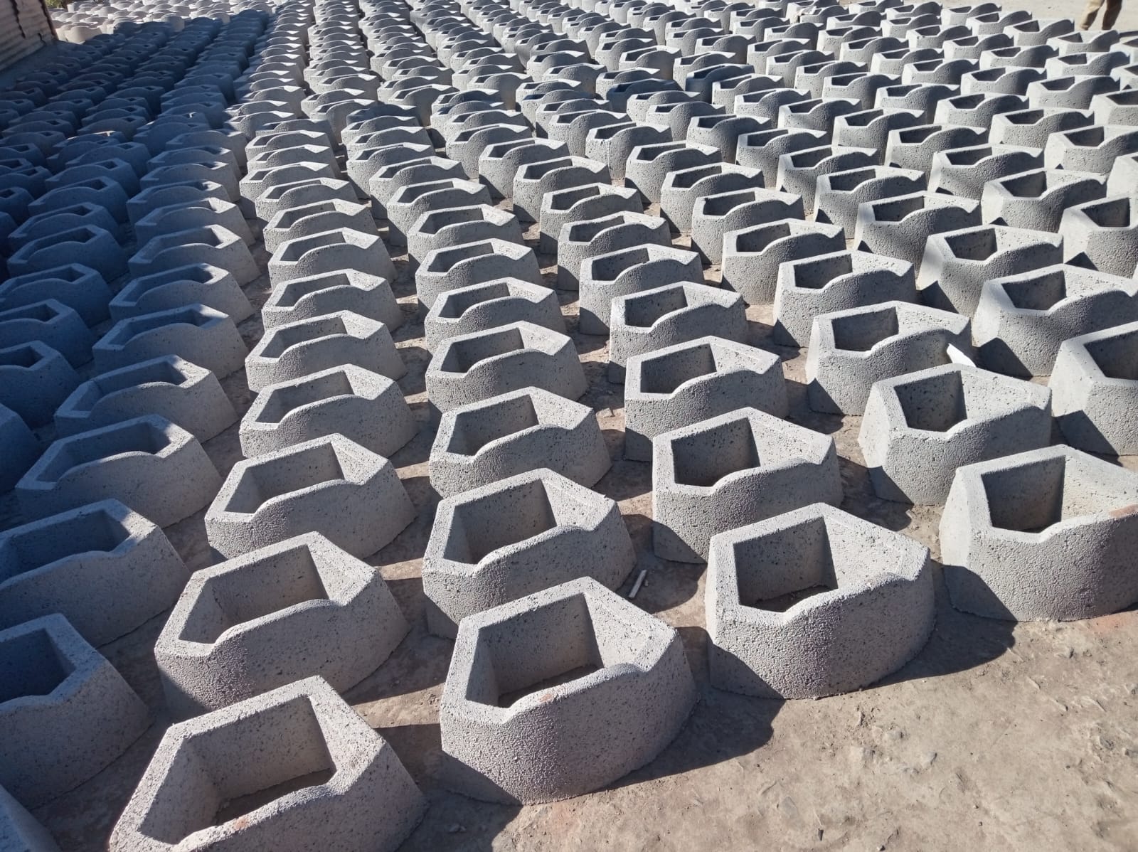 Freshly cast precast concrete products curing in rows at the Illovo Concrete production yard